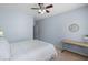 This bedroom features a ceiling fan and space for a desk and other furniture at 2245 Long Bow Chase, Kennesaw, GA 30144
