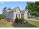 Charming single-Gathering home featuring manicured landscaping, a two-car garage, and a well-maintained lawn at 2245 Long Bow Chase, Kennesaw, GA 30144