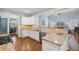 Modern kitchen with granite countertops, stainless steel appliances, and white cabinets at 2245 Long Bow Chase, Kennesaw, GA 30144