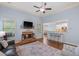 Comfortable living room with fireplace, and bar seating area with view into the kitchen at 2245 Long Bow Chase, Kennesaw, GA 30144