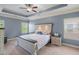 Spacious main bedroom with tray ceiling, neutral carpeting, and abundant natural light at 2245 Long Bow Chase, Kennesaw, GA 30144
