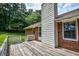 Back deck with a brick exterior at 3223 Heritage Way, Buford, GA 30519