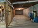 Unfinished basement space showcasing potential for customization with exposed ductwork and concrete block walls at 3223 Heritage Way, Buford, GA 30519