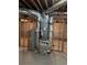 Basement featuring modern HVAC system and water heater, ensuring energy efficiency and comfort at 3223 Heritage Way, Buford, GA 30519