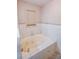 Close-up of bathroom featuring a tub with jets at 3223 Heritage Way, Buford, GA 30519