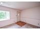 Bright entryway featuring fresh paint, a carpeted floor, and an abundance of natural light at 3223 Heritage Way, Buford, GA 30519