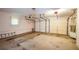 Picture of a large empty garage with garage doors at 3223 Heritage Way, Buford, GA 30519