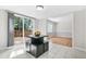 Eat-in kitchen with backyard deck access and open view to a living space at 998 Pointer Rdg, Tucker, GA 30084