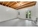 Spacious unfinished basement area with access doors, exposed ceiling, and utility sink at 1548 Valley Reserve Court, Kennesaw, GA 30152