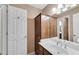 A bathroom with a white countertop, vanity with storage, and a mirror at 1548 Valley Reserve Court, Kennesaw, GA 30152