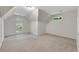 An upstairs bonus room offers natural light and cozy carpet at 1548 Valley Reserve Court, Kennesaw, GA 30152