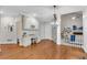 Breakfast area features a built-in desk, hardwood floors and is open to the living room at 1548 Valley Reserve Court, Kennesaw, GA 30152