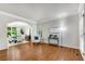 Spacious living room featuring hardwood floors, and arched entry to the dining room at 1548 Valley Reserve Court, Kennesaw, GA 30152