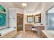 Elegant bathroom with glass enclosed shower, garden tub, and double vanity at 1548 Valley Reserve Court, Kennesaw, GA 30152