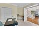 Office with carpet floors, built-in desk, and view to foyer at 1548 Valley Reserve Court, Kennesaw, GA 30152