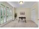 Bright office with carpet floors, natural light, plantation shutters, and a work area at 1548 Valley Reserve Court, Kennesaw, GA 30152