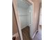 A well-organized closet with a wire shelf for optimal storage at 170 Inverness Trce, Riverdale, GA 30274