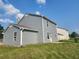Exterior home view shows backyard with full siding, fencing, and partial blue sky at 170 Inverness Trce, Riverdale, GA 30274