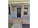 Charming front door framed by columns at 170 Inverness Trce, Riverdale, GA 30274