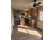 Kitchen featuring wood cabinets, granite countertops, and stainless steel appliances at 170 Inverness Trce, Riverdale, GA 30274
