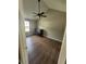 Bedroom with neutral walls, modern flooring, fan and ample natural light at 170 Inverness Trce, Riverdale, GA 30274