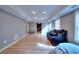 Finished basement with recreation space and vinyl floors that provide a comfortable and modern look at 3145 Sweet Basil Ln, Loganville, GA 30052