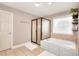 Bright bathroom featuring a shower, large bathtub, and neutral tiling, creating a soothing and functional space at 3145 Sweet Basil Ln, Loganville, GA 30052