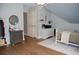 Bedroom with hardwood floors, nice furnishings, and an angled ceiling at 3145 Sweet Basil Ln, Loganville, GA 30052