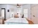 Bright eat-in kitchen area with a round table next to the island and pantry at 3145 Sweet Basil Ln, Loganville, GA 30052