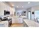 Updated kitchen with stainless steel appliances, granite countertops and wooden floors at 3145 Sweet Basil Ln, Loganville, GA 30052
