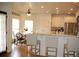 Bright kitchen with granite countertops, stainless steel appliances, and a cozy breakfast nook at 3145 Sweet Basil Ln, Loganville, GA 30052