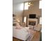 Inviting living room with high ceilings, brick fireplace, and neutral decor at 3145 Sweet Basil Ln, Loganville, GA 30052