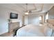 Spacious main bedroom with hardwood floors and modern ceiling fan, providing a stylish and comfortable sanctuary at 3145 Sweet Basil Ln, Loganville, GA 30052