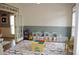 Bright playroom with storage cubbies and colorful play area at 3145 Sweet Basil Ln, Loganville, GA 30052
