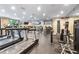Spacious gym featuring state-of-the-art equipment and mirrors for a complete and convenient fitness experience at 4248 River Green Dr # 305, Atlanta, GA 30327