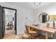 Bright home office featuring a wooden desk, stylish chair, and lots of natural light at 4248 River Green Dr # 305, Atlanta, GA 30327