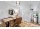Bright home office featuring a wooden desk, stylish chair, and lots of natural light at 4248 River Green Dr # 305, Atlanta, GA 30327
