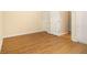 Neutral bedroom with hardwood floors and ample closet space at 5821 Saint Miles Drive Dr, Buford, GA 30518