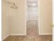 Spacious walk-in closet with carpet and wire shelving ready for storage at 5821 Saint Miles Drive Dr, Buford, GA 30518