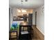 Eat-in kitchen with stainless steel appliances and room for dining at 1925 Sailcloth St, Lithonia, GA 30058