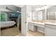 Luxurious main bathroom offering dual sinks, a vanity area, and convenient access to the main bedroom at 2220 Cape Courage Way, Suwanee, GA 30024