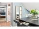 Walk-in closet with custom storage, an island with drawers, and a view to the Primary Bedroom at 2220 Cape Courage Way, Suwanee, GA 30024