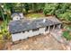 Aerial view of the house showing the spacious backyard and the additional storage building at 276 Lydia Se Dr, Atlanta, GA 30315