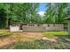 Exterior backyard view of a one-story house with a patio at 276 Lydia Se Dr, Atlanta, GA 30315
