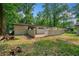 Exterior backyard view of a one-story house with a patio at 276 Lydia Se Dr, Atlanta, GA 30315