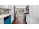 Modern kitchen with stainless steel appliances, bright white cabinets, and colorful accents at 276 Lydia Se Dr, Atlanta, GA 30315