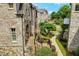 Brick and stone homes with landscaped walkways at 4853 Stonehall Pl, Atlanta, GA 30339