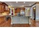Spacious kitchen with a large island, stainless steel appliances, and custom cabinetry at 4853 Stonehall Pl, Atlanta, GA 30339