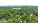 Aerial view featuring the address of the home with lush green trees in a neighborhood setting at 1026 Reeder N Cir, Atlanta, GA 30306