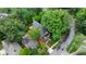 An aerial view of a home with lush trees, patio, pool, offering a secluded and private feel at 1026 Reeder N Cir, Atlanta, GA 30306